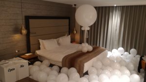 Hotel Room full Of Balloons for proposal